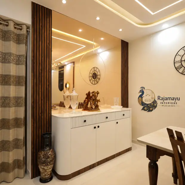 Dining with crockery and display unit by Rajamayu Interiors