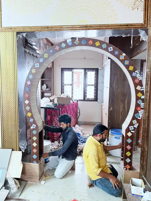 Arched partition being assembled on site