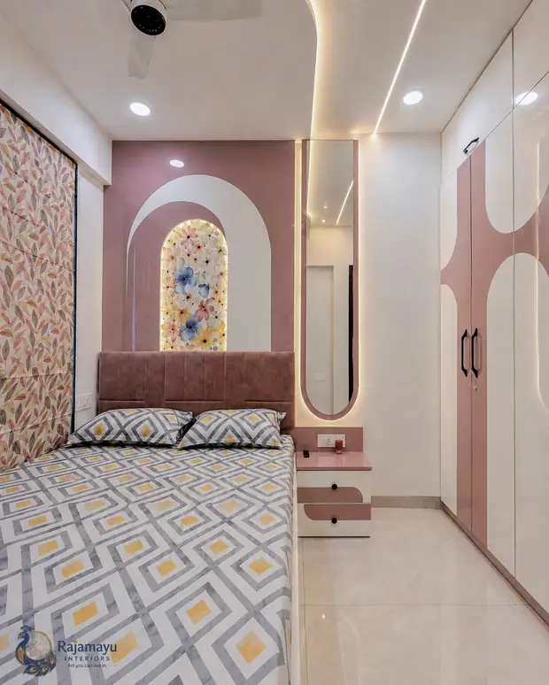 Bedroom with arched mirror detail by Rajamayu Interiors