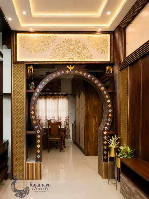 Arched partition with tile inlay by Rajamayu Interiors